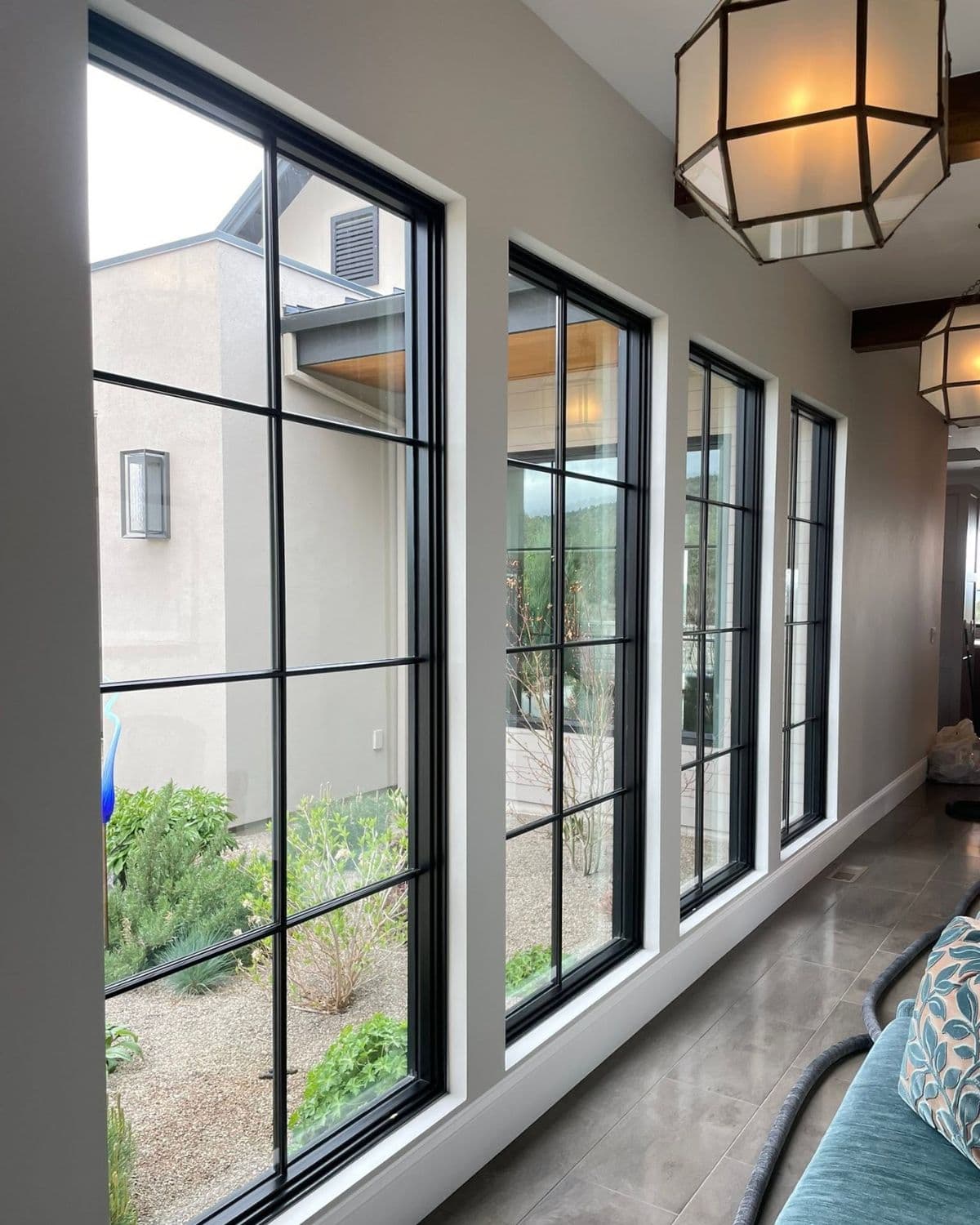 Bright interior with spotless floor-to-ceiling windows cleaned by Kleanly